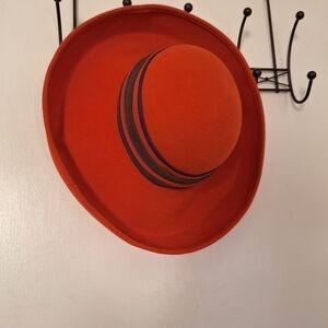 Adolfo orange wool hat with green and purple ribbon